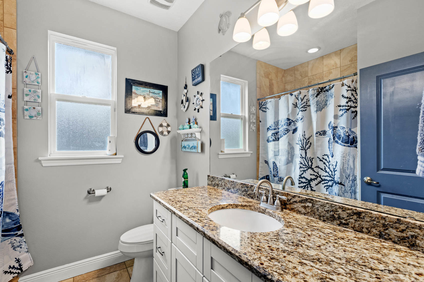 bathroom with marble counter